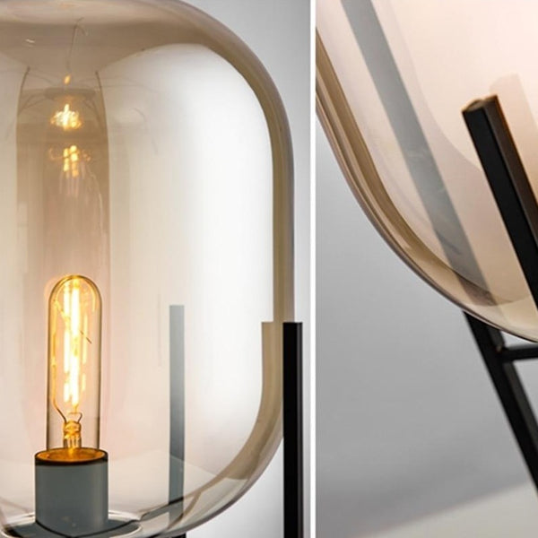 Lights of scandinavia - Fyr - Modern table/floor lighting with E27 fixture. Works just as good in the bedroom as in corridors, hallways or as spot lighting in a living area. Fun fact: "Fyr" means lighthouse in Swedish.  Iron framework with two glass colors to choose from.
