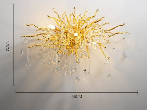 Lights of Scandinavia - Ooze (Wall) - Majestic crystal chandelier. Unique drop shaped crystal lighting for dining rooms, living areas, entrance halls, hotel areas, restaurants, etc.    K9 crystals with silver/gold metal plated aluminum frame. - A work of art.