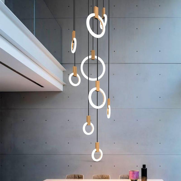 Lights of Scandinavia - Halo - Wood acrylic lighting design chandelier pendant LED light source. Stair case lighting.